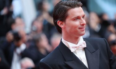 Patrick Schwarzenegger attends the "The Phoenician Scheme" red carpet at the 78th annual Cannes Film Festival at Palais des Festivals on May 18