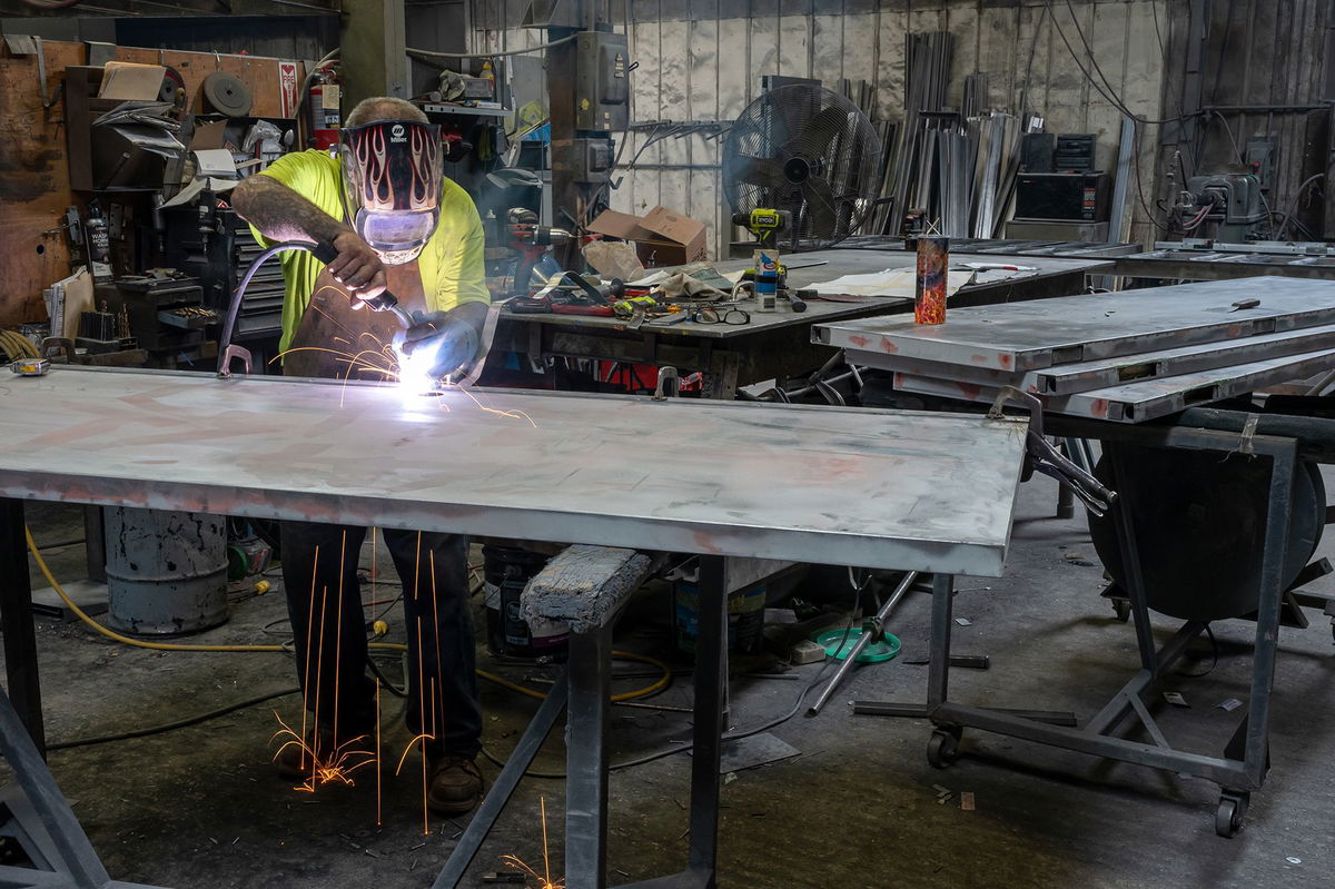 <i>David Paul Morris/Bloomberg/Getty Images via CNN Newsource</i><br/>A worker arc welds a metal door during production at the Metal Manufacturing Co. facility in Sacramento
