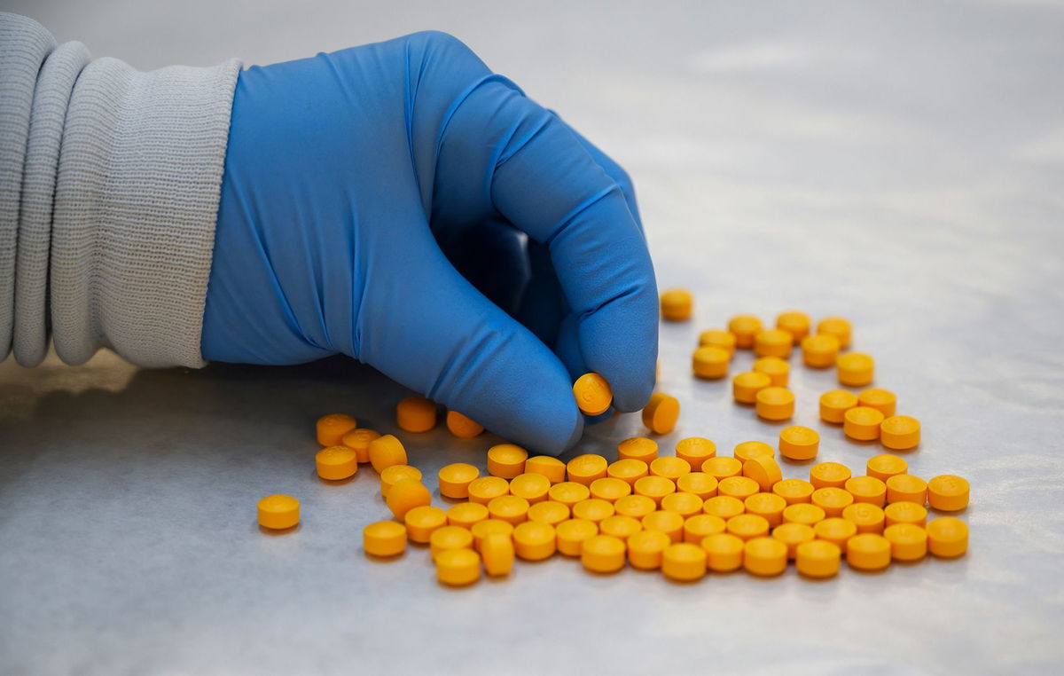 <i>Don Emmert/AFP/Getty Images via CNN Newsource</i><br/>Synthetic fentanyl is sold illegally as a powder on blotter paper