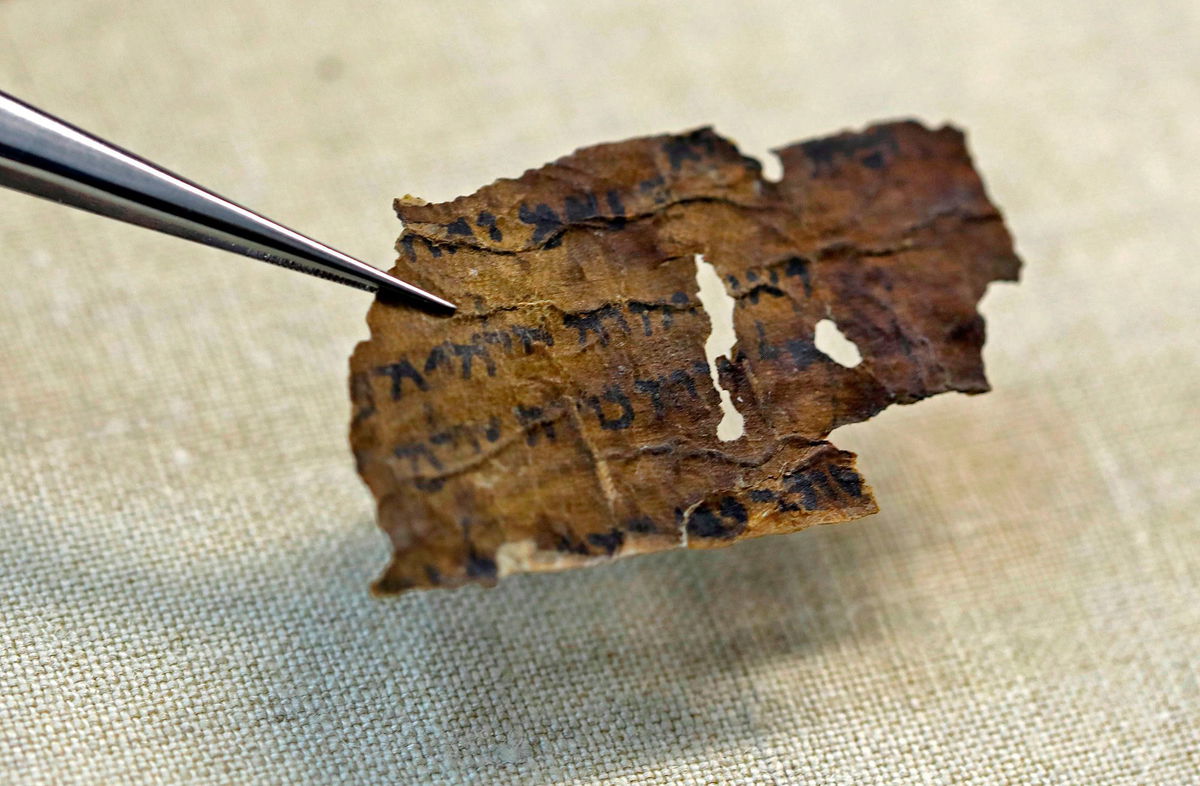 <i>Menahem Kahana/AFP/Getty Images via CNN Newsource</i><br/>AI analysis of Dead Sea Scroll fragments suggests some of the ancient manuscripts are up to 100 years older than once thought.