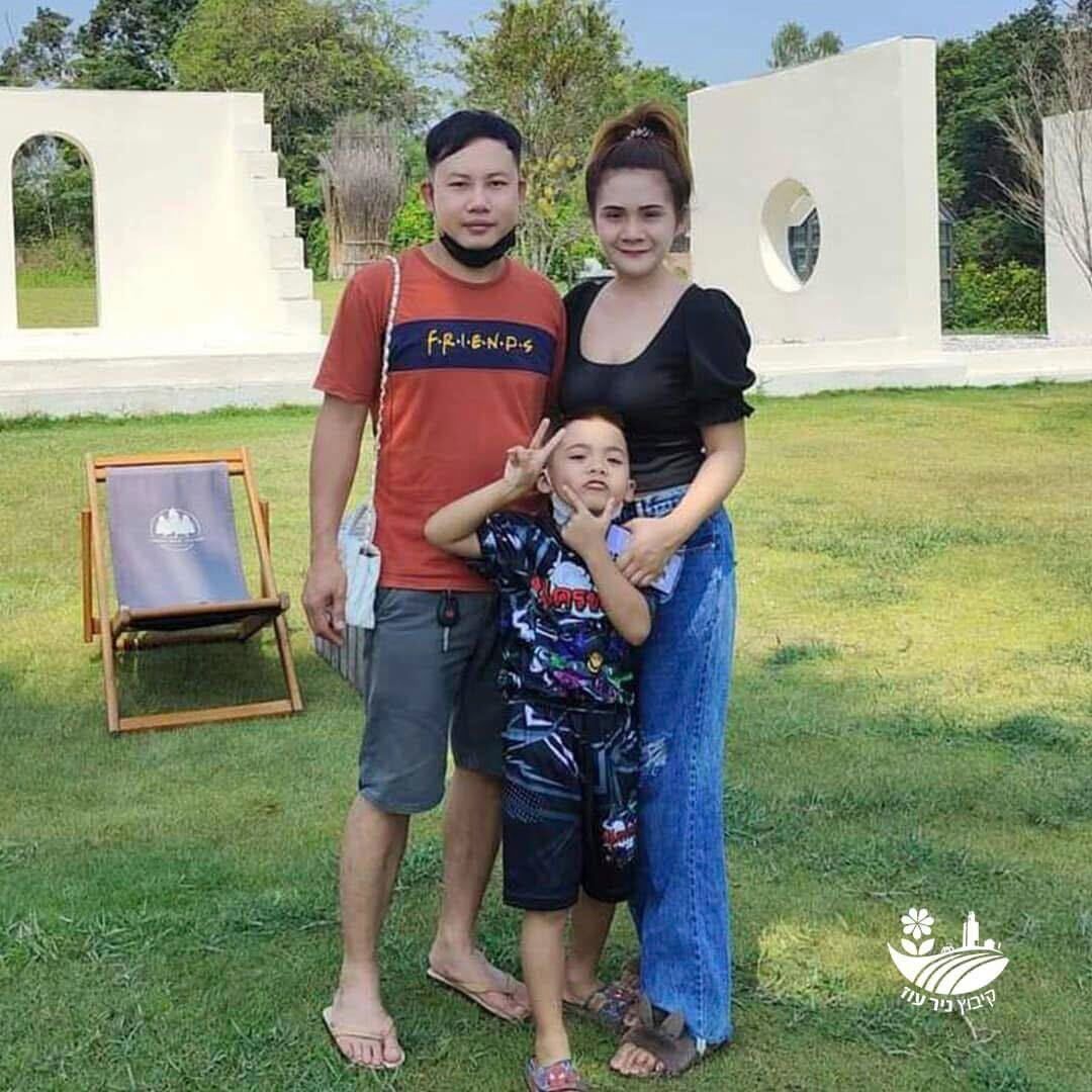 <i>Hostage's Family Forum/AP via CNN Newsource</i><br/>Nattapong Pinta with his wife and son.