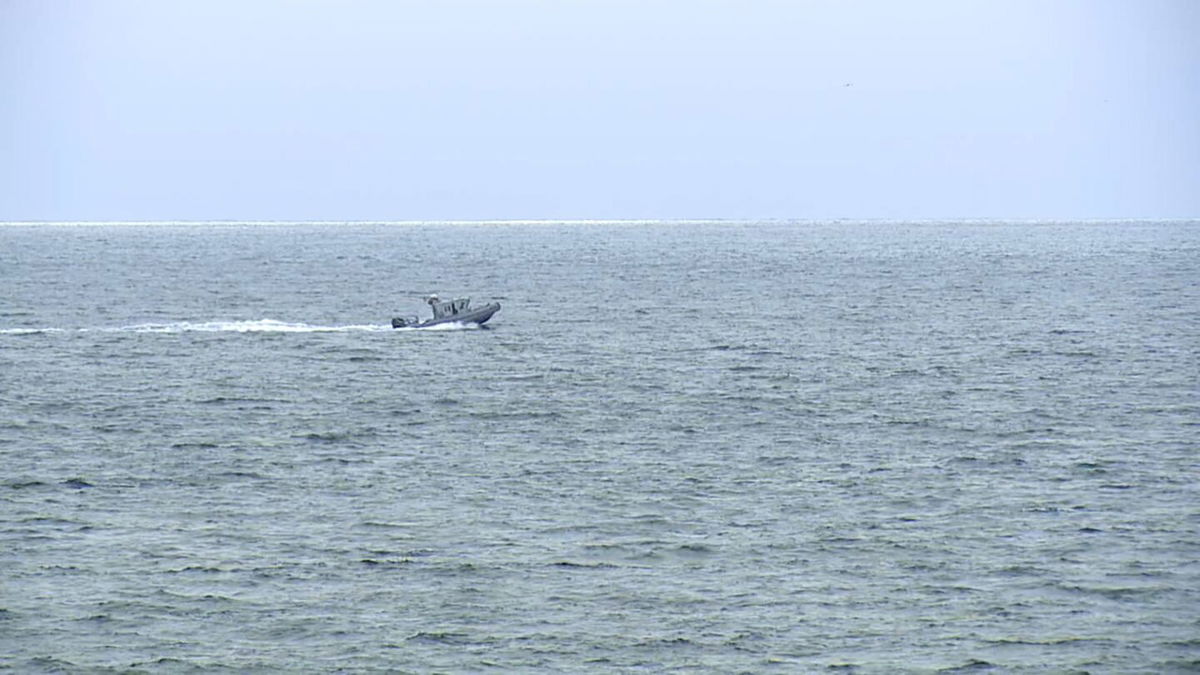 <i>KGTV via CNN Newsource</i><br/>A boat searches for survivors of a plane crash near Point Loma