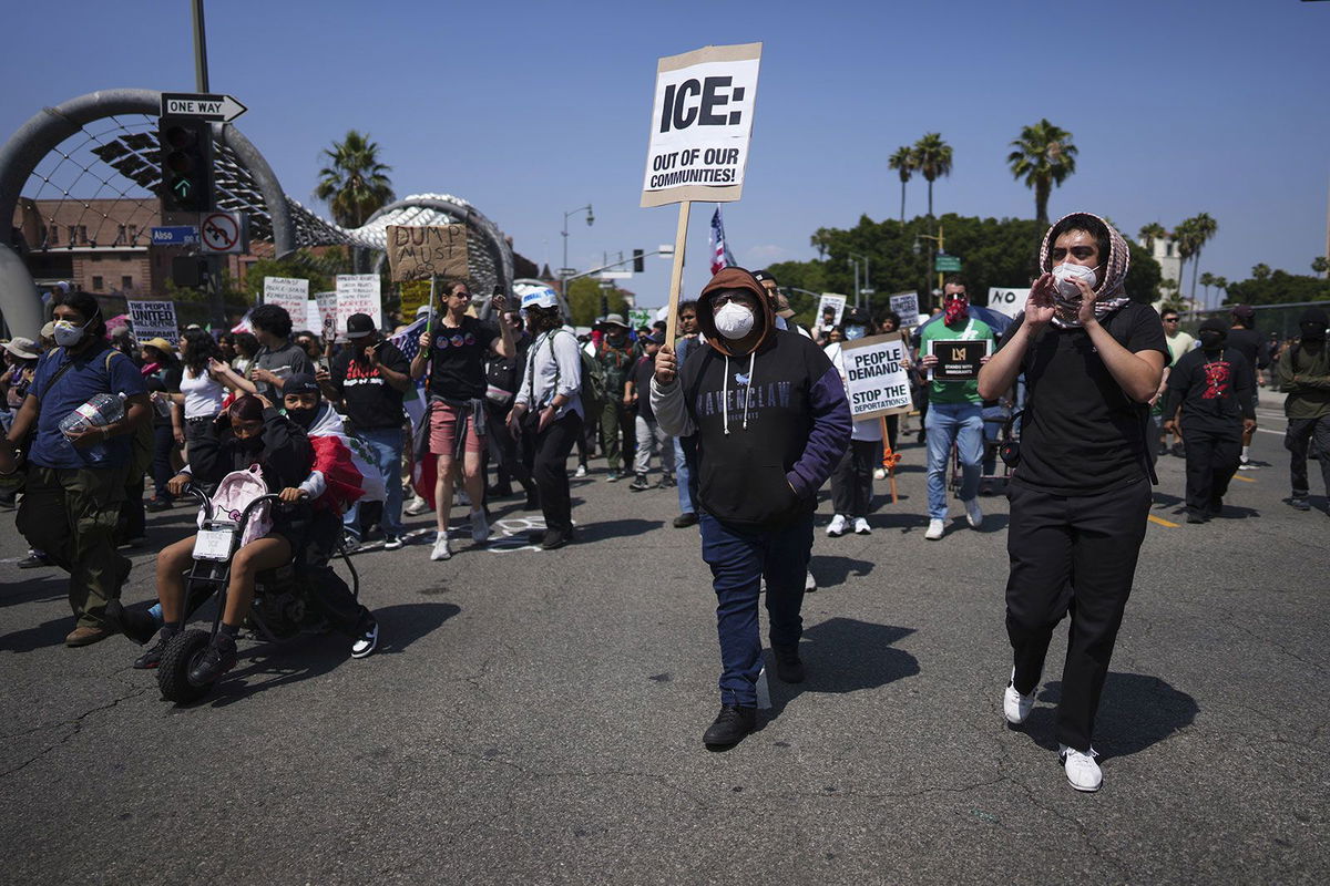 <i>Eric Thayer/AP via CNN Newsource</i><br/>Protesters gather near the Metropolitan Detention Center on June 9 in downtown Los Angeles.
