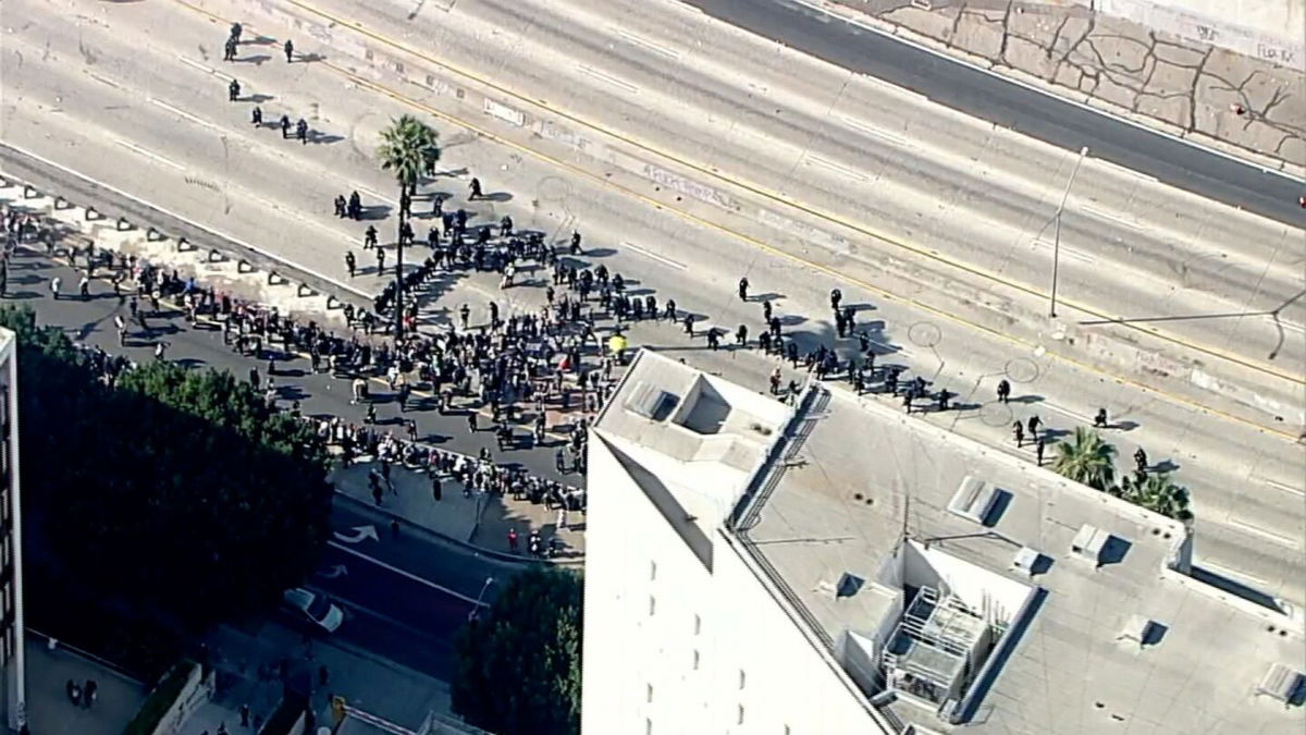 <i>KABC via CNN Newsource</i><br/>Police use an 