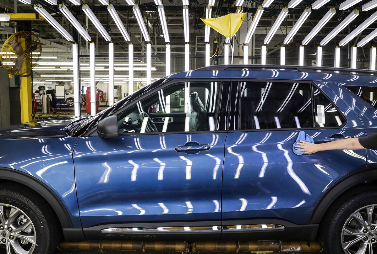 <i>Amr Alfiky/AP via CNN Newsource</i><br/>A Ford employee works on an Explorer line at the company's Chicago assembly plant in 2019. Ford reportedly shut the plant for a week due to the lack of rare earth magnets needs to build the car