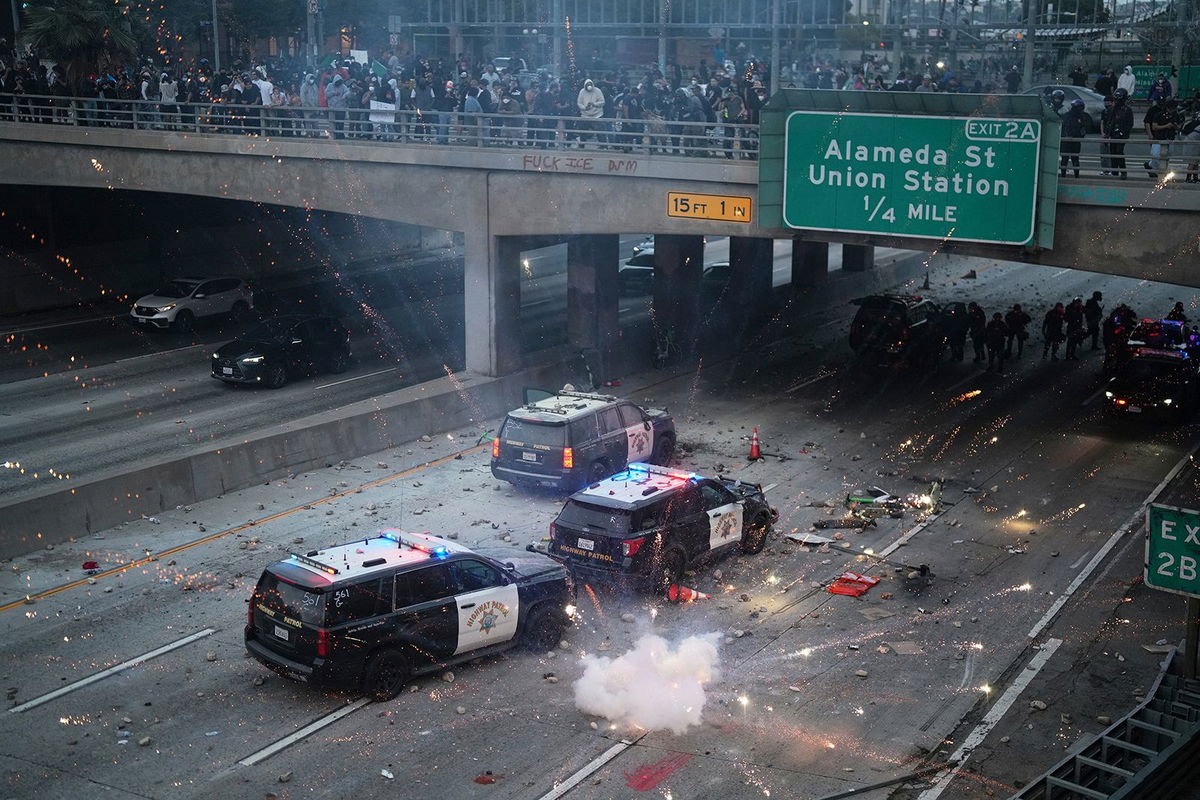 <i>Frederic J. Brown/AFP/Getty Images via CNN Newsource</i><br/>Demonstrators rally against US Immigration and Customs Enforcement and call for the release of union leader David Huerta