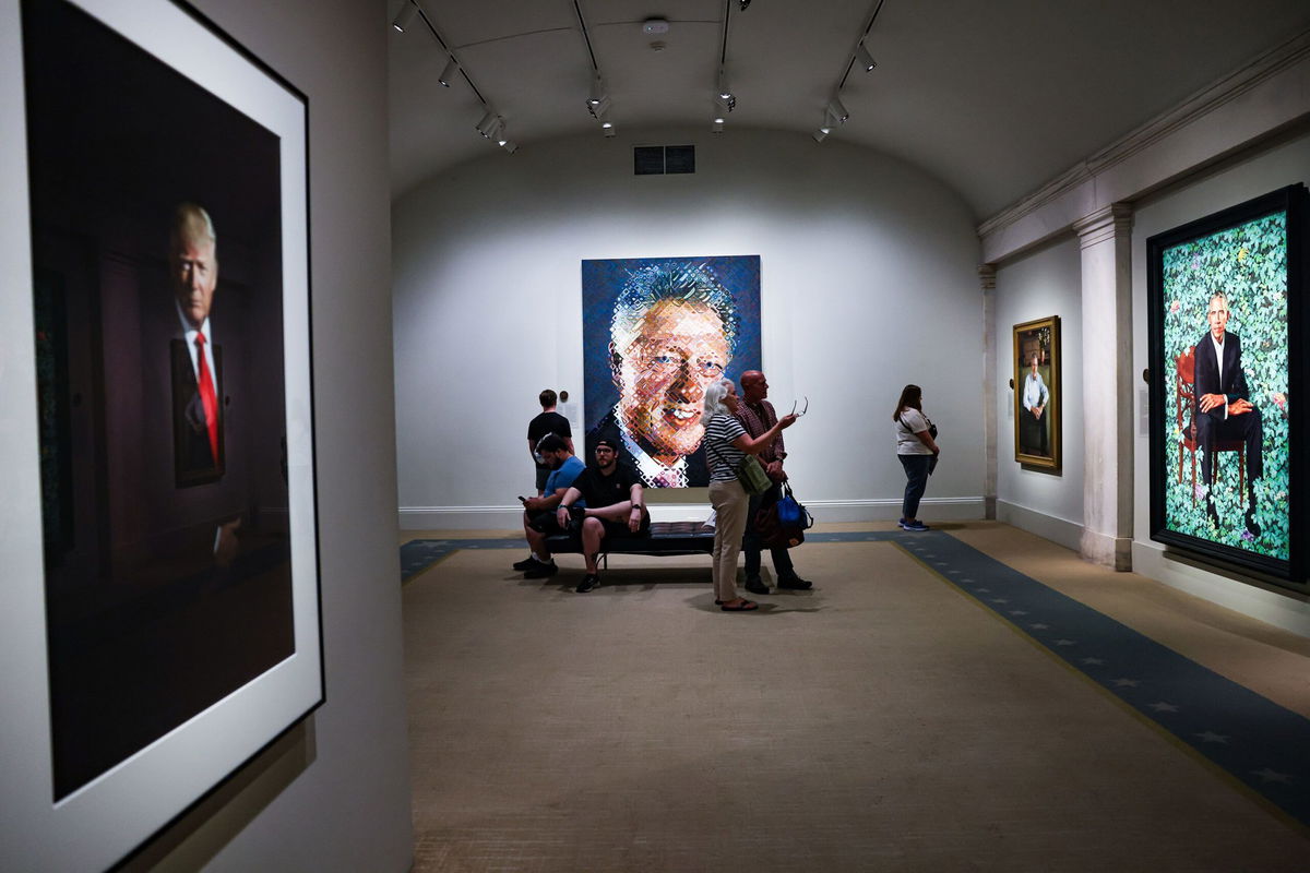 <i>Valerie Plesch/For The Washington Post via Getty Images via CNN Newsource</i><br/>Visitors tour the