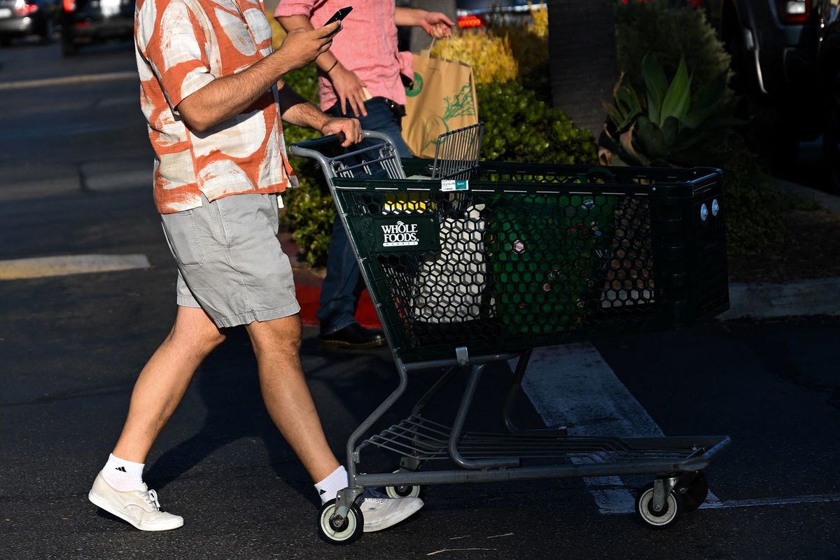 <i>Patrick T. Fallon/AFP/Getty Images via CNN Newsource</i><br/>Whole Foods says it is working to restock shelves following a cyberattack that has disrupted operations at United Natural Foods