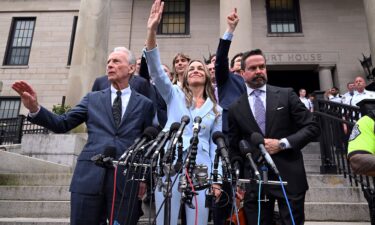 Karen Read supporters cheer for her outside Norfolk Superior Court on June 18. One sign holder implores people not to forget John O'Keefe after the jury delivered its verdict in her murder retrial.
