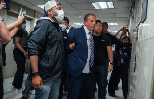 New York City Comptroller Brad Lander is placed under arrest by masked Immigration and Customs Enforcement and FBI agents outside federal immigration court on Tuesday in New York.