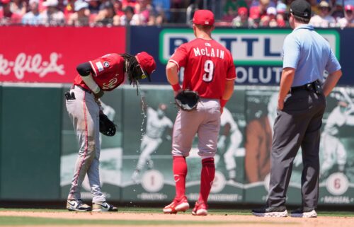 Seattle Mariners pitcher Trent Thornton had to be helped off the field during the eighth inning at Wrigley Field.
