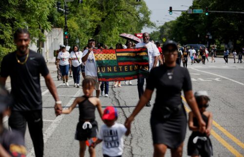 Residents of the historic Pullman neighborhood celebrate Juneteenth during a parade and block party hosted by the National A. Philip Randolph Pullman Porter Museum in Chicago on Thursday.