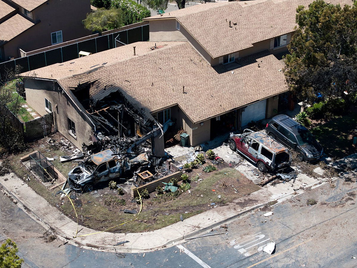 <i>William Liang/AP via CNN Newsource</i><br/>NTSB investigators find San Diego jet was flying too low on its descent path before fiery crash and seen here debris covers the ground after the small plane crashed into a San Diego neighborhood