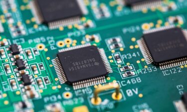 An integrated circuit microchip manufactured by Texas Instruments. The company pledged a major investment to expand US plants.