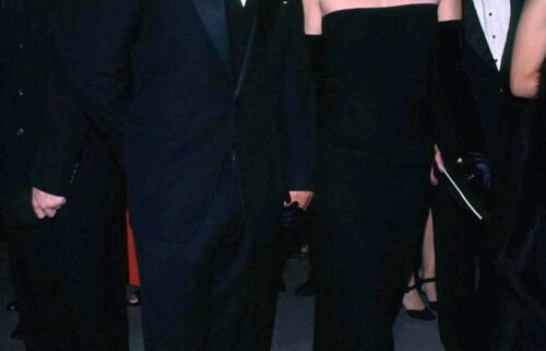 A tortoise shell headband and kick-flare jeans are among the key elements of Bessette-Kennedy's signature look.