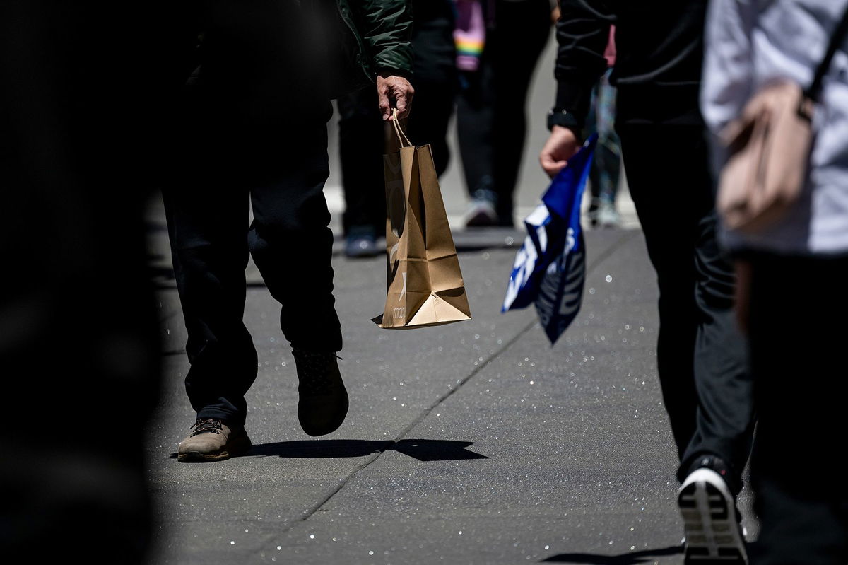 <i>Brandon Bell/Getty Images via CNN Newsource</i><br/>An employee counts inventory in a Walmart Supercenter on May 15 in Austin