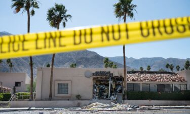 A police line is seen outside a damaged American Reproductive Centers fertility clinic after a bomb blast outside the building in Palm Springs
