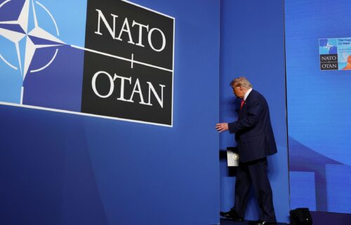 President Donald Trump leaves following a press conference at the NATO summit in The Hague