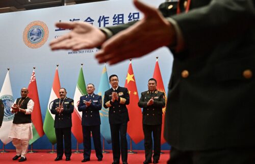 Defense ministers including China's Dong Jun (second from right) gather for a group photo during the SCO defense minister's meeting on Wednesday.