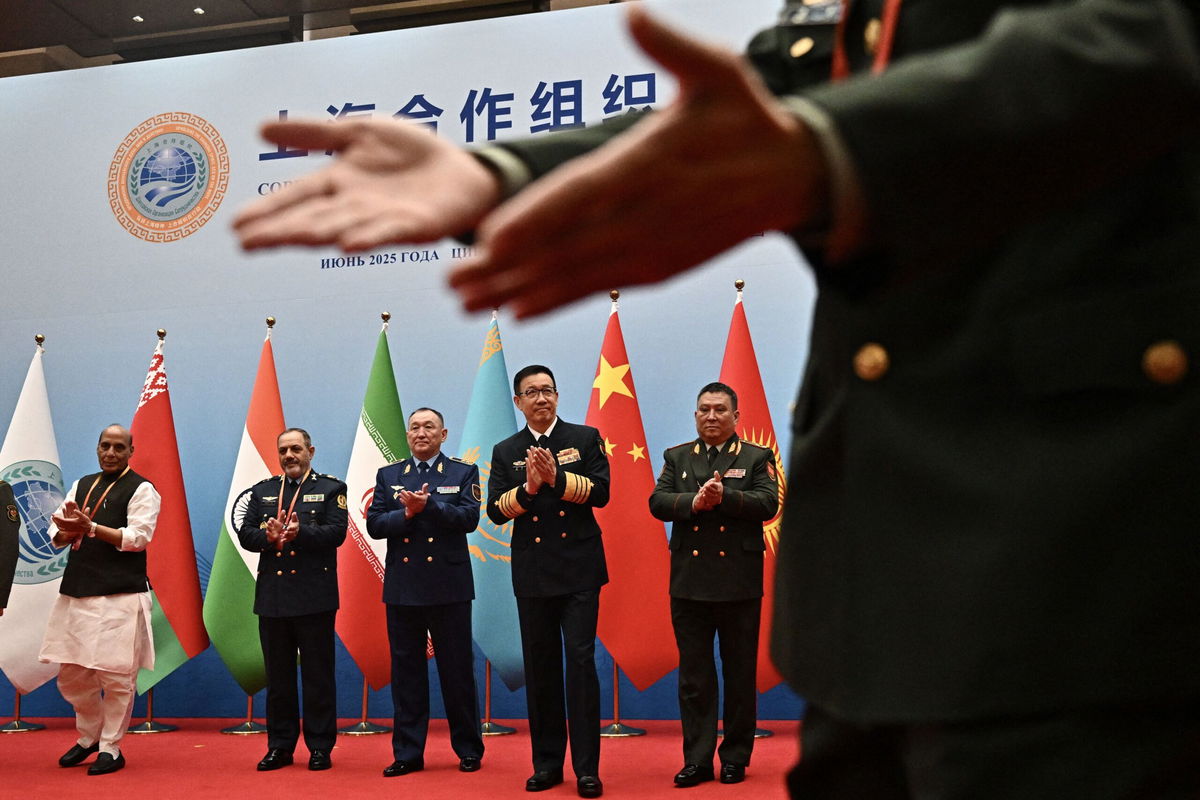 <i>Pedro Pardo/AFP/Getty Images via CNN Newsource</i><br/>Defense ministers including China's Dong Jun (second from right) gather for a group photo during the SCO defense minister's meeting on Wednesday.