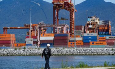 Cargo containers are stacked at the Centerm container terminal in Vancouver