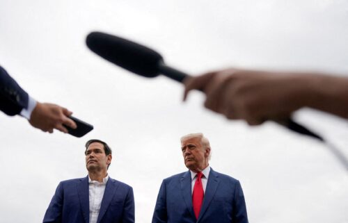 President Donald Trump stands next to Secretary of State Marco Rubio at Morristown Municipal Airport in Morristown