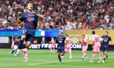 Inter Miami's Lionel Messi and Paris Saint-Germain's Warren Zaire-Emery fight for the ball during the FIFA Club World Cup 2025.