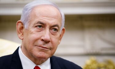 Israeli Prime Minister Benjamin Netanyahu attends a meeting with US President Donald Trump in the Oval Office of the White House in Washington