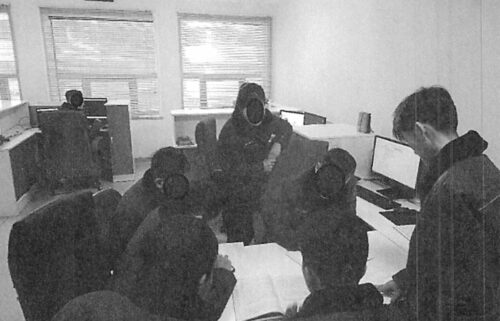 This photo from the US District Court District of Massachusetts shows North Korean information technology workers on a multi-member team that the US Department of Justice says works with the North Korean government to fund its regime. Note: Parts of the image provided by the US District Court District of Massachusetts have been obscured.