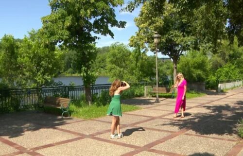 More singles are turning to professionals to take their pictures for online dating apps in an effort to attract better matches.