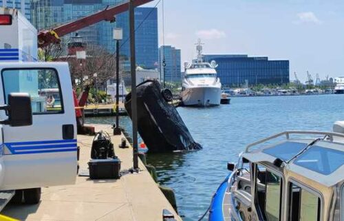 Baltimore police said the underwater recovery team received a notification about a possible submerged vehicle near East Pratt Street around 9:30 a.m. Once there
