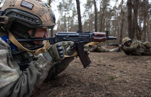 A newly recruited Ukrainian soldier with the 33rd Separate Mechanized Brigade practices shooting and reloading his gun during military training in Dnipropetrovsk