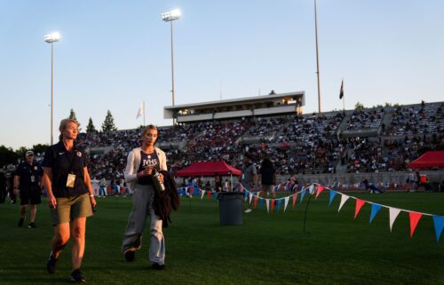 AB Hernandez stands on the podium during a medal ceremony for the triple jump at the California high school track-and-field championships in Clovis