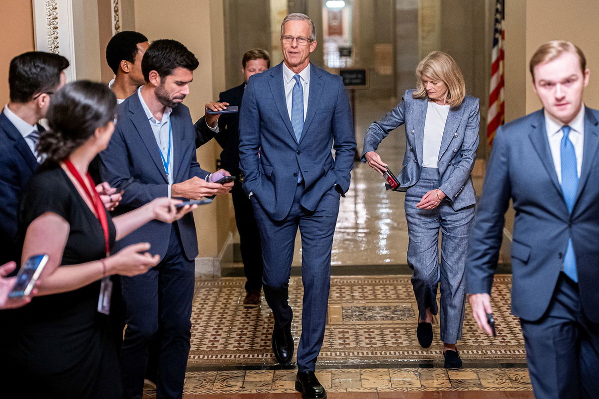 <i>Nathan Howard/Reuters via CNN Newsource</i><br/>Senate Majority Leader John Thune and Sen. Lisa Murkowski (R-AK) walk to the US Senate floor