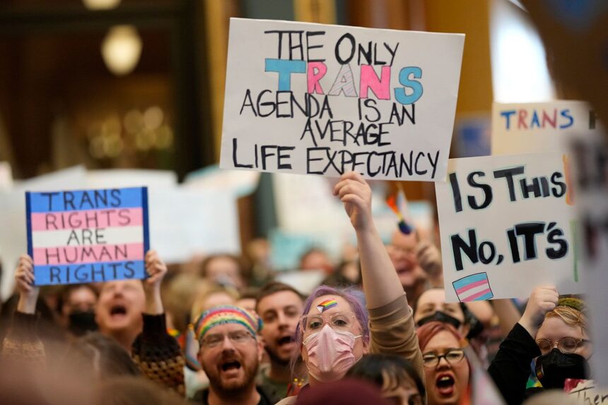 Protesters filled the Iowa state Capitol in February to denounce legislation aimed at stripping the state civil rights code of protections based on gender identity. The law took effect July 1.