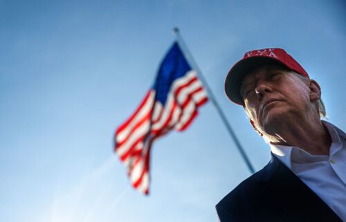 US President Donald Trump talks to members of the press as he departs from the South Lawn of the White House in Washington