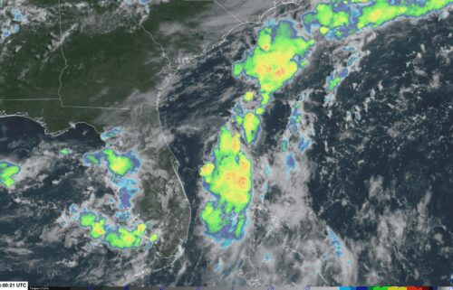 Stormy weather (indicated by the colored clouds) bubbles up near and over the Southeast on Thursday morning in the area the National Hurricane Center is keeping an eye on for tropical development.