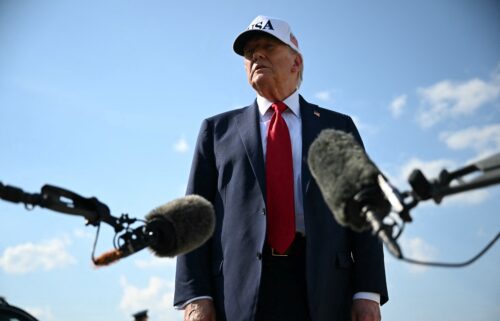 President Donald Trump speaks to reporters at Joint Base Andrews in Maryland as he departs to deliver remarks the Iowa State Fairgrounds in Des Moines on Thursday.