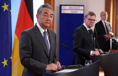 German Foreign Minister Johann Wadephul and Chinese Foreign Minister Wang Yi speak to the media following talks on July 3