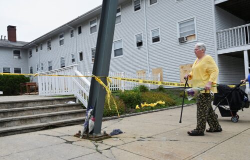 Residents of Gabriel House Assisted Living Facility make their way to an emergency shelter set up at the Timao Center