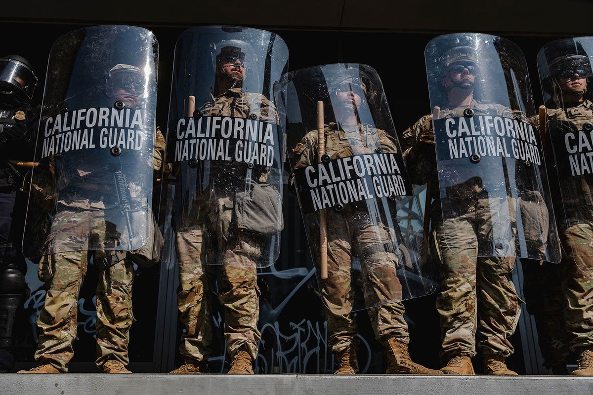 <i>Jim Vondruska/Getty Images/File via CNN Newsource</i><br/>National Guardsmen stand outside of the Edward Roybal Federal Building in downtown Los Angeles
