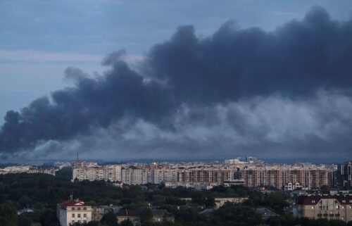 Smoke is seen in the city after a Russian drone and missile strike