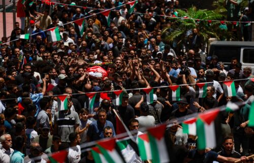 People carry the body of Saif Musallet during his funeral near Ramallah
