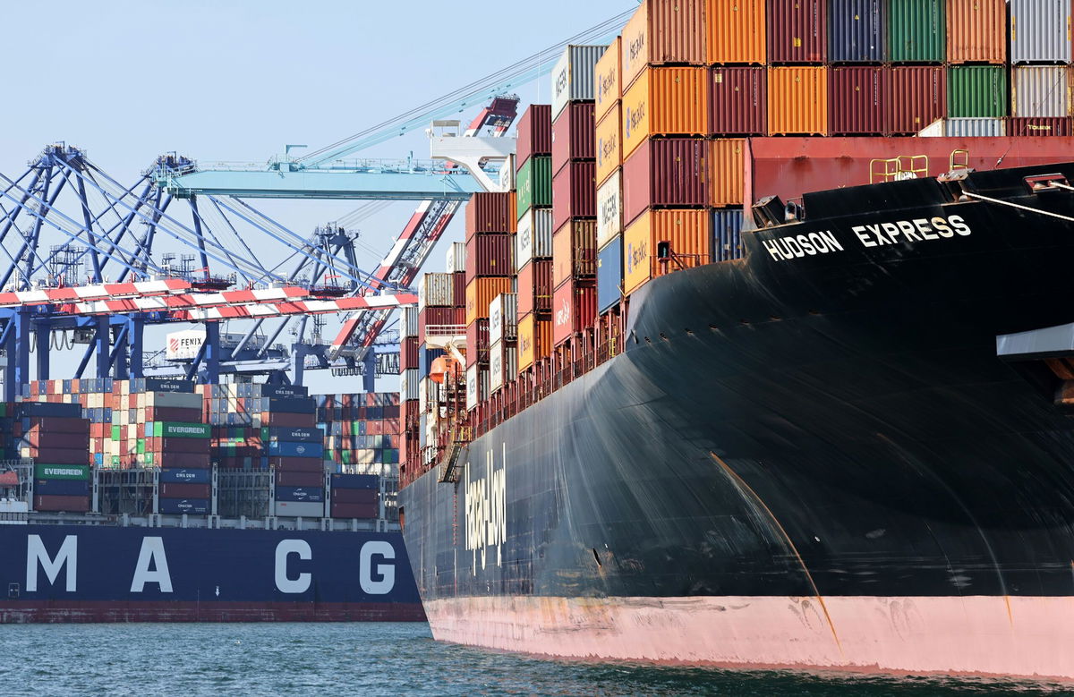 <i>Mario Tama/Getty Images via CNN Newsource</i><br/>Shipping containers are stacked on container ships at the Port of Los Angeles on June 25. The port had its best June on record as importers raced to get ahead of higher tariffs.
