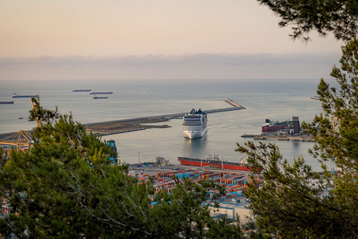 <i>Davide Bonaldo/SOPA Images/LightRocket/Getty Images via CNN Newsource</i><br/>A cruise ship is seen at the Port of Barcelona