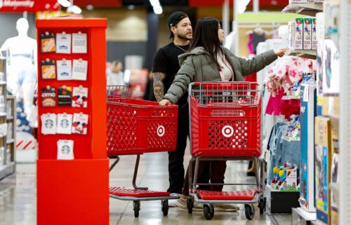 Shoppers look for bargains at a Target in Chicago. The retail is ending its "price match" policy later this month.