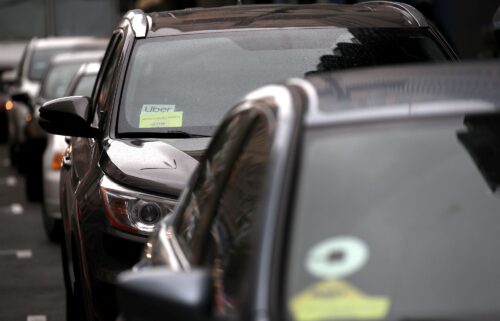 The Uber logo is displayed on a car on March 22