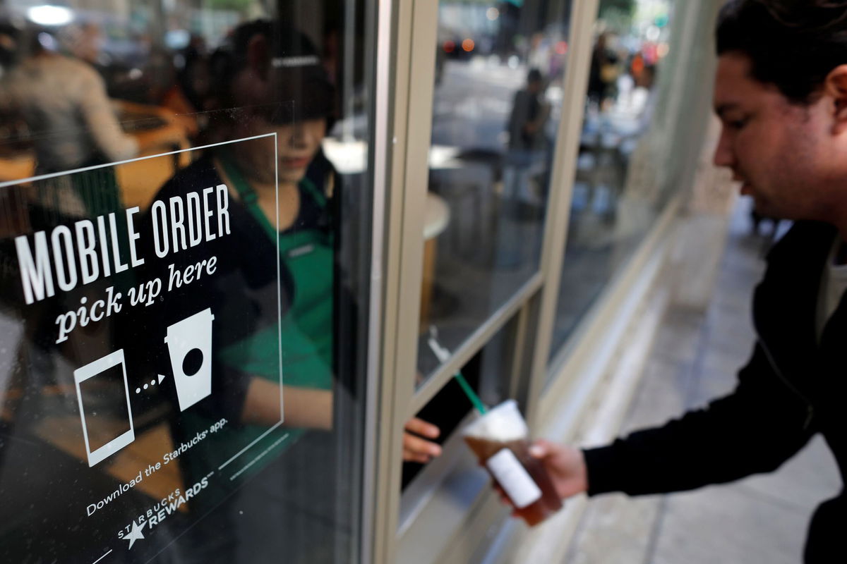 <i>Mike Blake/Reuters via CNN Newsource</i><br/>Starbucks is closing its "Pick Up" locations in the coming months.