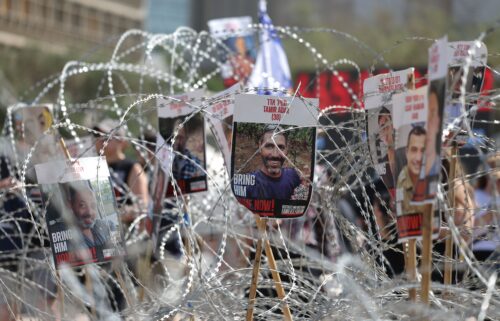 A poster outside the Tel Aviv Museum of Art showing hostage Evyatar David