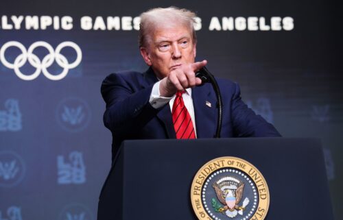 President Donald Trump takes questions from reporters after signing an executive order to create a White House task force to help coordinate logistical issues related to the 2028 Summer Olympic Games.